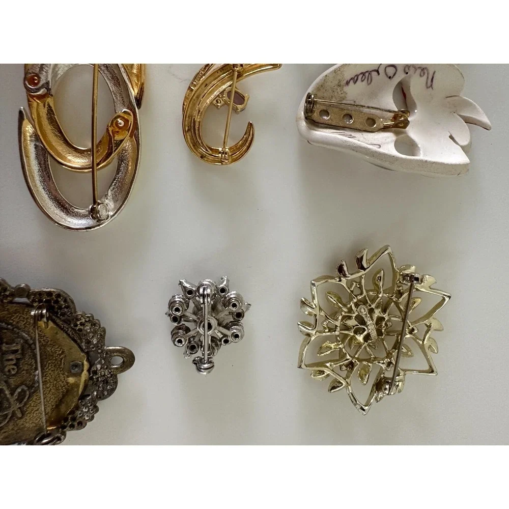 The Unbranded Brand brooch painted